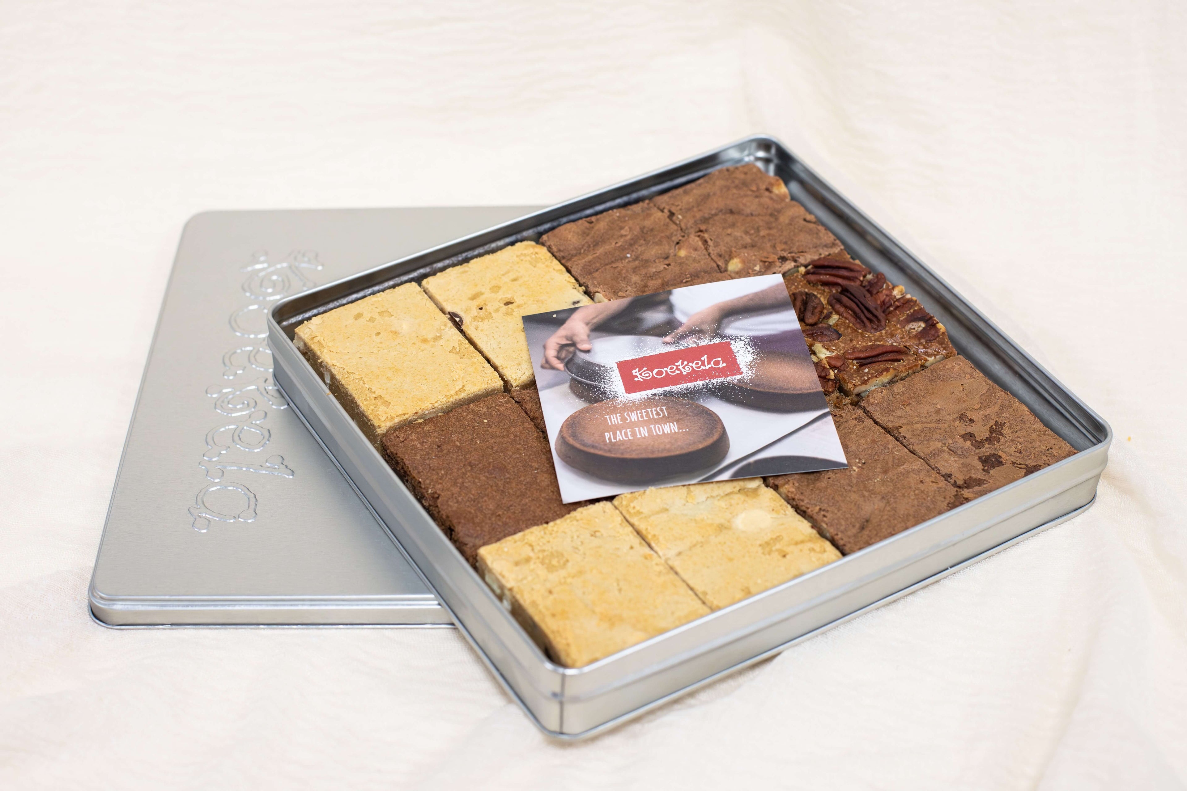 Koekela’s Silver Tin Filled With 12 Brownies And Blondies